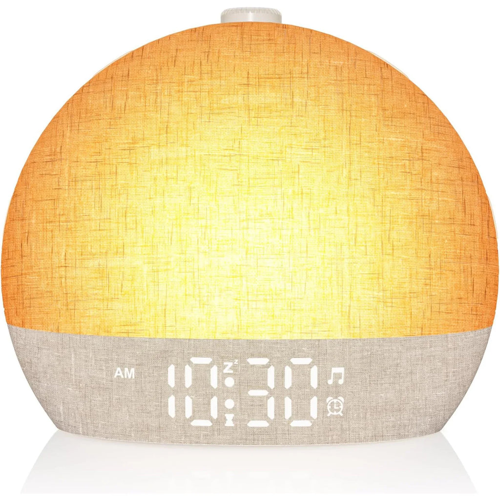 Sunrise Alarm Wake-Up Light glowing on a bedside table